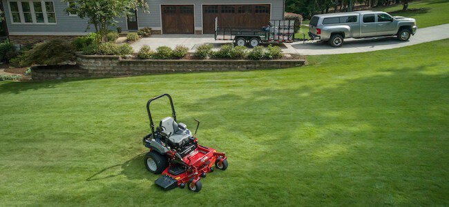 Exmark Lazer Z sitting on a lush lawn